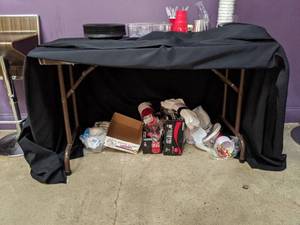 lot 4369 image: Brown table w a black table cover