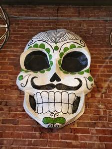 lot 2402 image: Green Paper Mache Sugar Skull