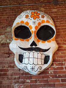 lot 2404 image: Orange Paper Mache Sugar Skull