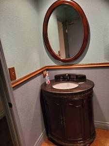 lot 2443 image: Bathroom Vanity, Mirror, Paper Towel Dispenser