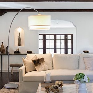 lot 22495 image: Brightech Mason - Arc Floor Lamp with Unique Hanging Drum Shade for Living Room Matches Your Decor - Arching Over The Couch from Behind, This Standing Pole Light Gets Compliments - Nickel