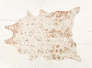 lot 22665 image: Signature Design by Ashley, Jaxith Accent Rug - Faux Cowhide - Brown