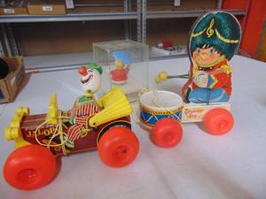 lot 3245 image: Fisher Price Drummer Boy ad Jalopy Pull Toy, Music Box