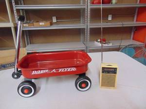 lot 3246 image: Radio Flyer Doll Wagon, Feeral Brand Transistor Radio