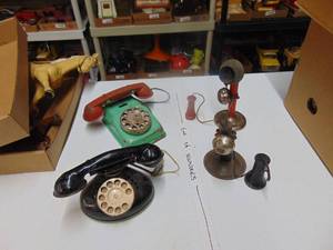 lot 3310 image: Four Toy Phones - Metal
