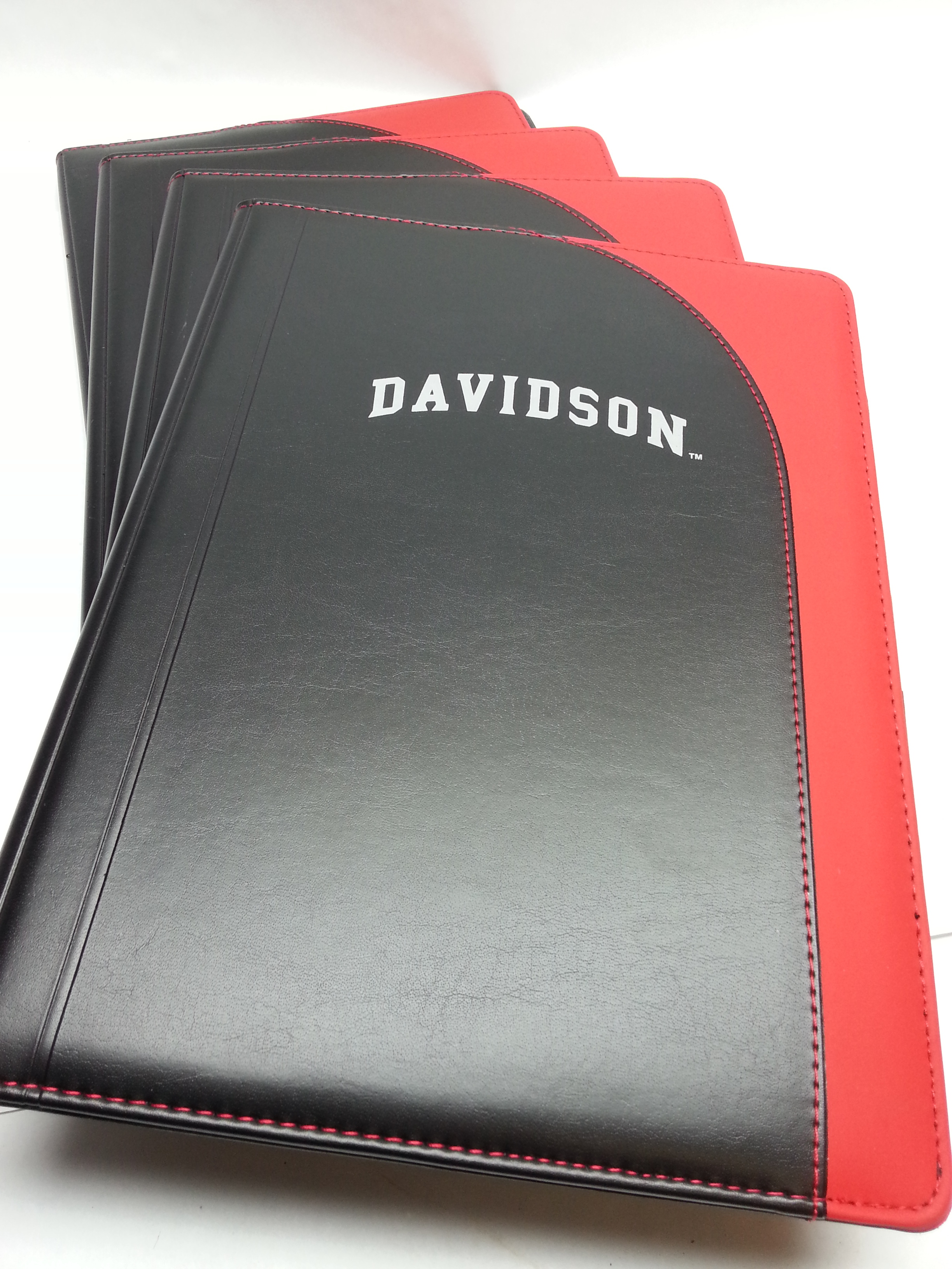 lot 1728 image: Set of 4 heavy padded 12-12 in X 9-12 writing pads in these cool looking folders.  Bid more $$ if you name is Davidson.