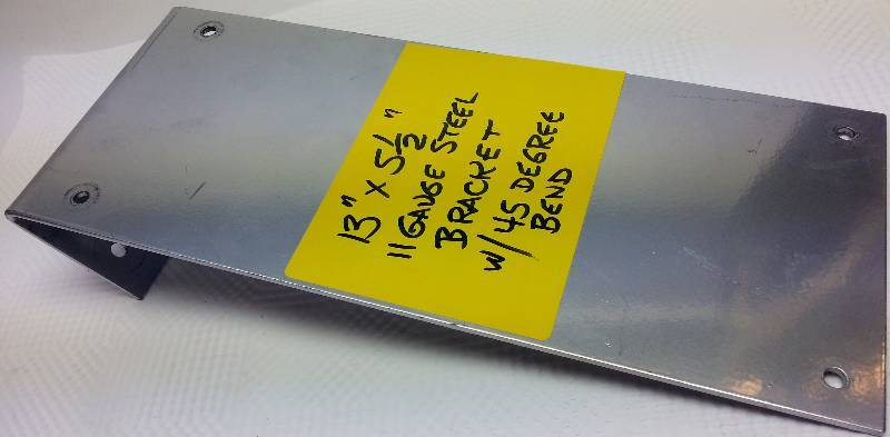 lot 1729 image: Serious 13 inches X 5-12 inches heavy steel plate with a 45 degree bent flange.