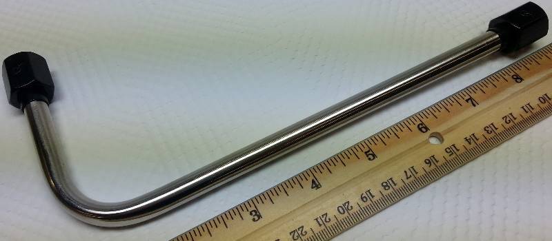 lot 1732 image: New polished stainless steel fuel transfer line with #6AN ends.  Designed for the single inlet Holley or Edelbrock performer series carburetors.