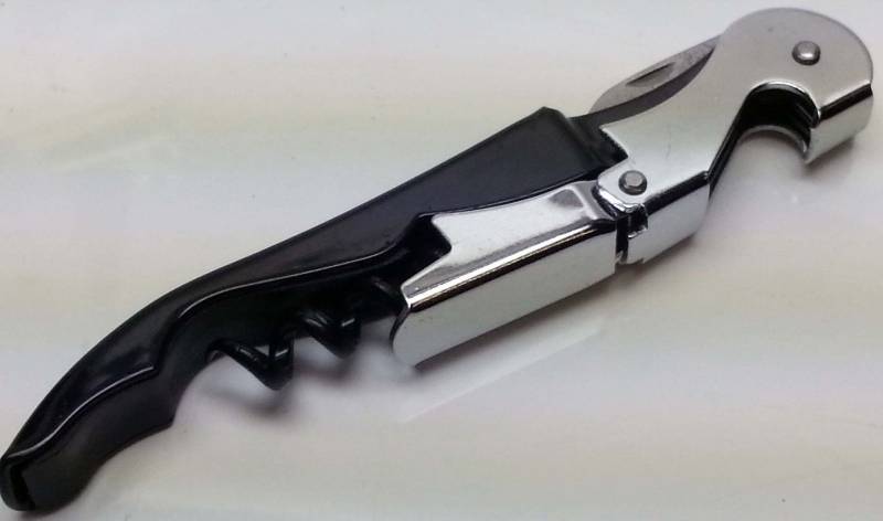 lot 1744 image: Multi tool cork screw bottle opener pocket knife promo for The Langham hotels