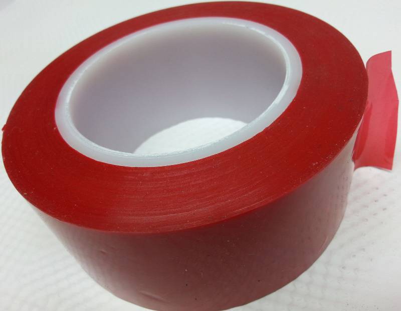 lot 9175-3 image: 60 yards X 2 in wide with 3 inch center Red plastic translucent 1 side adhesive tape.
