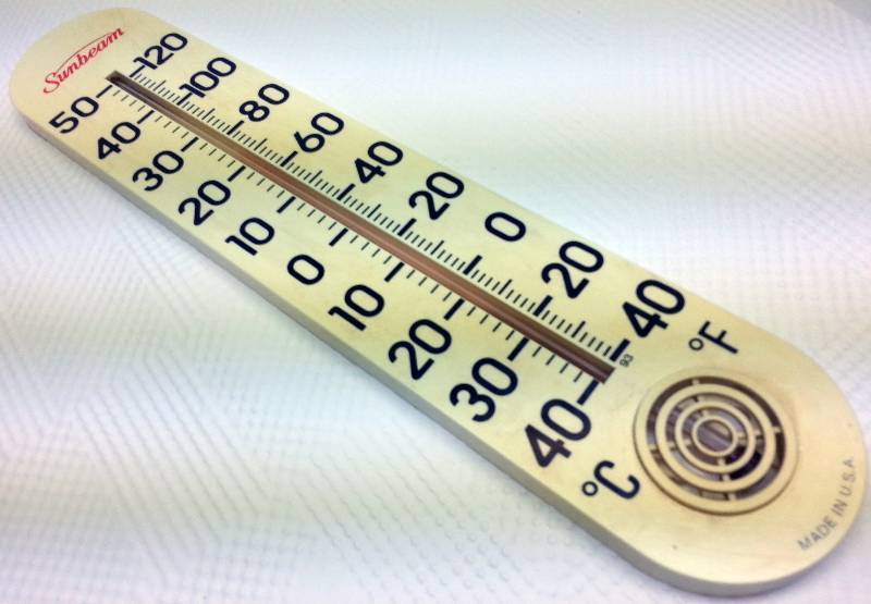 lot 1781 image: Easy to read even for me is this 15 inch tall out door Sunbeam (assuming the bread company) thermometer.