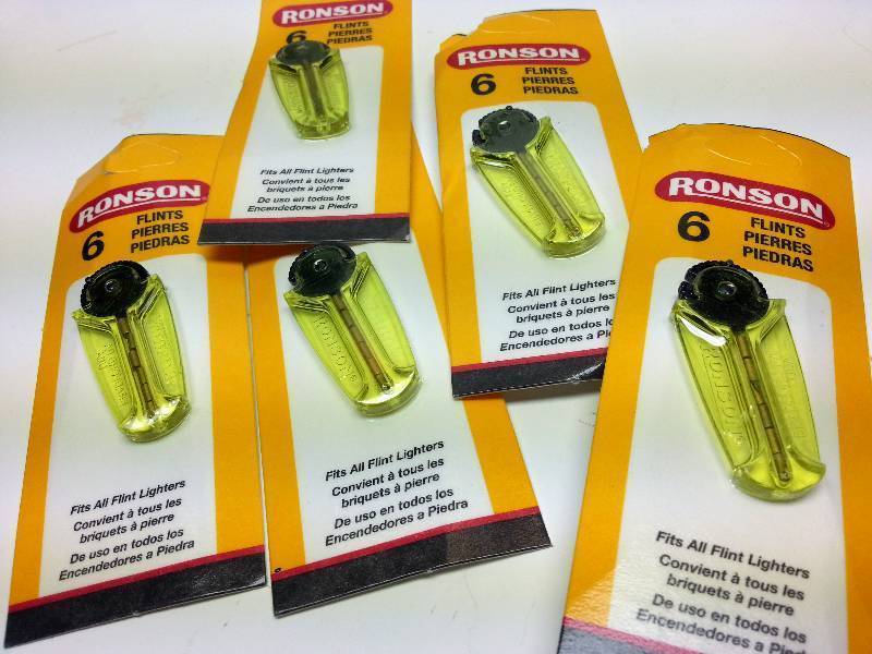lot 1317 image: 5 packs of 6 replacement flints that fit Zippo, Ronson or all flint lighters package