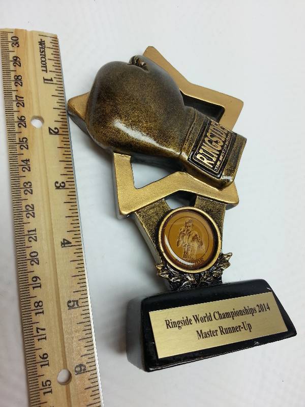 lot 1657-2 image: Award Trophy from the Combat Ringside auction a few weeks ago of the left over inventory.