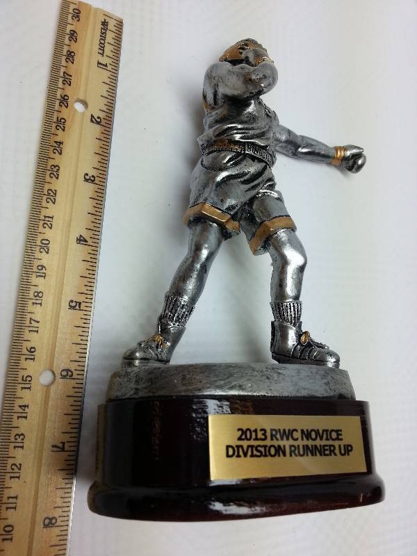 lot 1658-2 image: Award Trophy from the Combat Ringside auction a few weeks ago of the left over inventory.