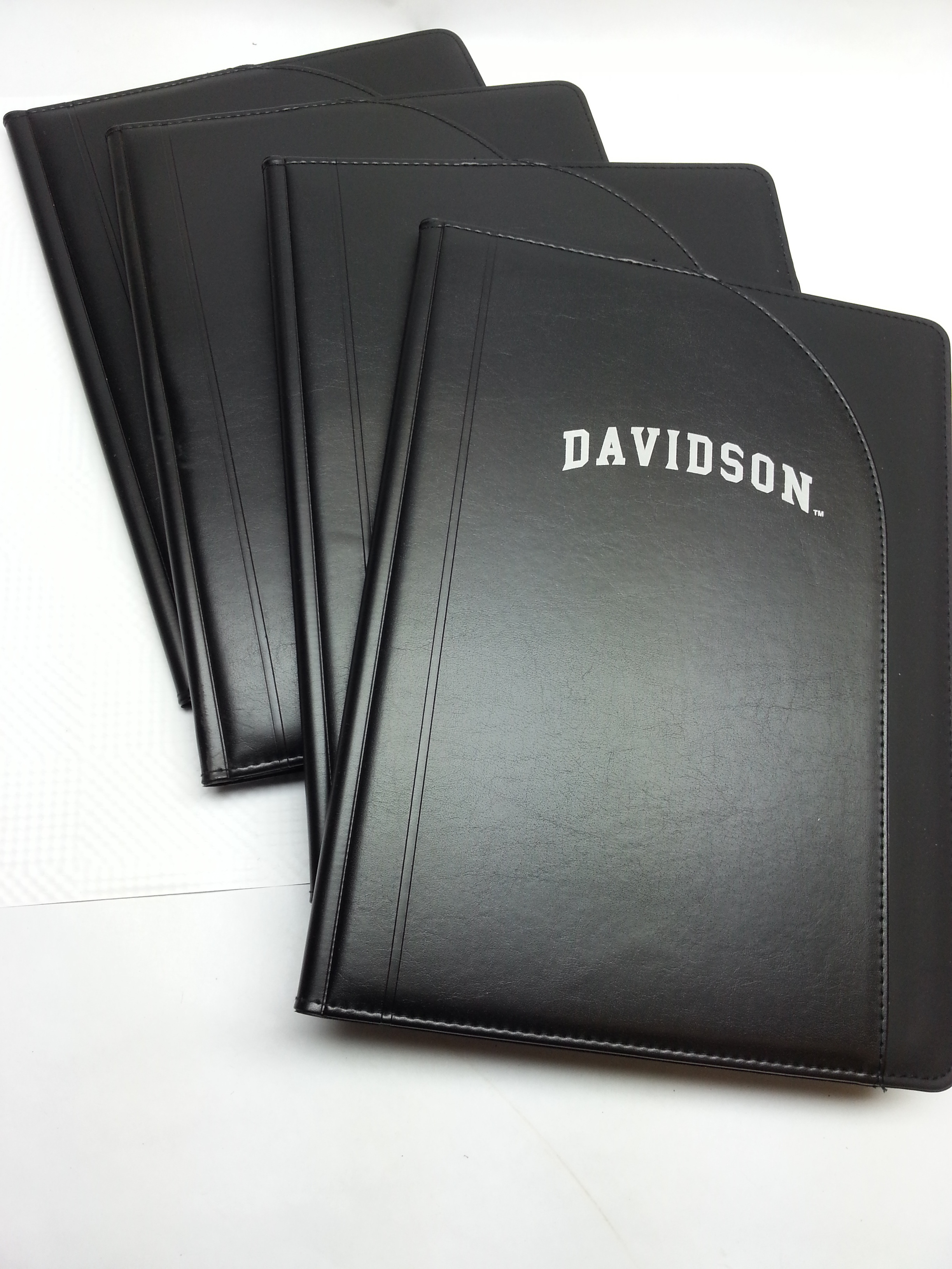 lot 9023 image: Set of 4 heavy padded 12-12 in X 9-12 writing pads in these cool looking folders.  Bid more $$ if you name is Davidson.