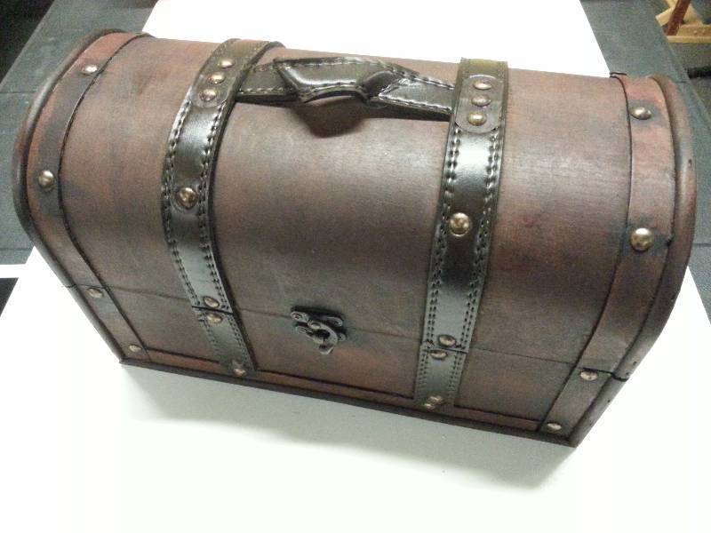 lot 9031 image: This is a new interior decorators imported wood basket box with metal brads, leather looking straps and handle with hinged lid and metal latch.