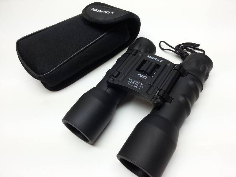 lot 9082-2 image: Actually made by Bushnell is this Tasco Essentials 16x32 FRP Compact set of Binoculars