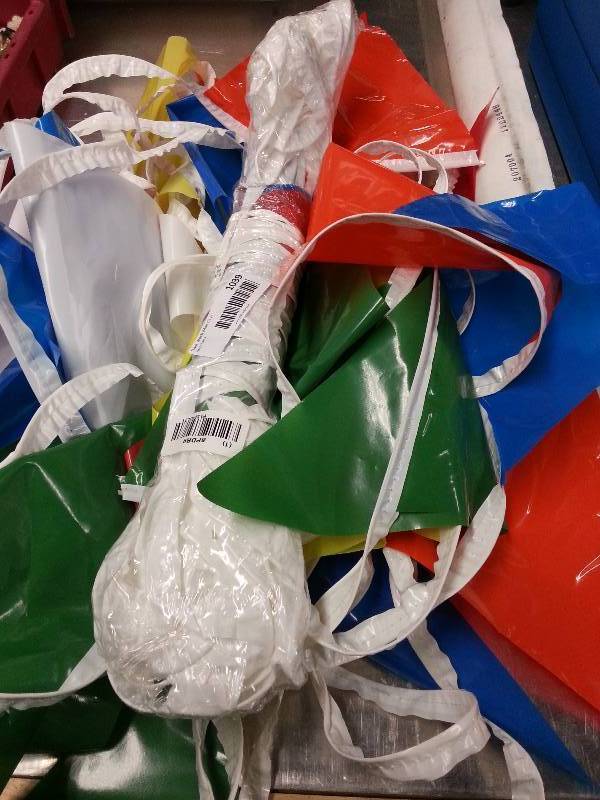 lot 9091 image: 100 feet of wild looking carnival style multi color flags for your car lot or display. Sold by Grainger part # 8PDR9