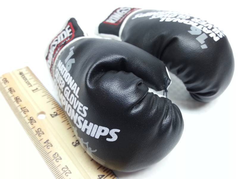 lot 9145 image: Hang these mini boxing gloves around your car or truck mirror or maybe your purse.