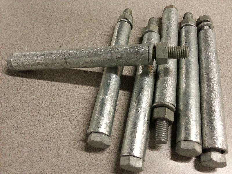 lot 1822 image: Set of 6 new galvanized 12 coarse thread bolts, nuts and sleeves for repair on the boat dock.
