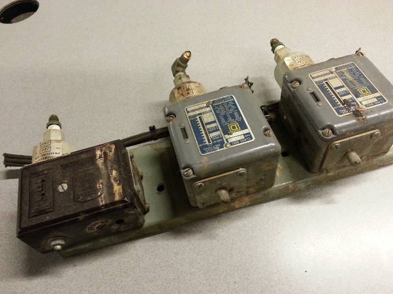 lot 1823 image: 3 electrical switch timers on a plate Im going to have to let the photos do the talking on this switch panel.