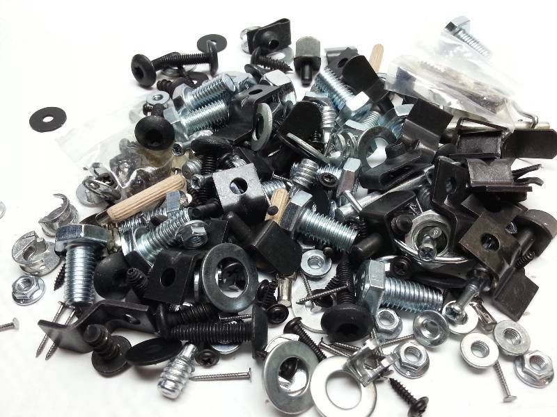 lot 1834 image: A wild assortment of NEW hardware for your late night needs 12 short bolts, nuts and metal screws