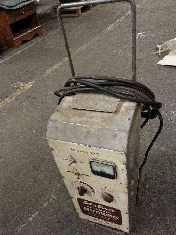 lot 3007 image: Silver Beauty model 275 shop battery charger Consignor says it looks humble but works good with all functions