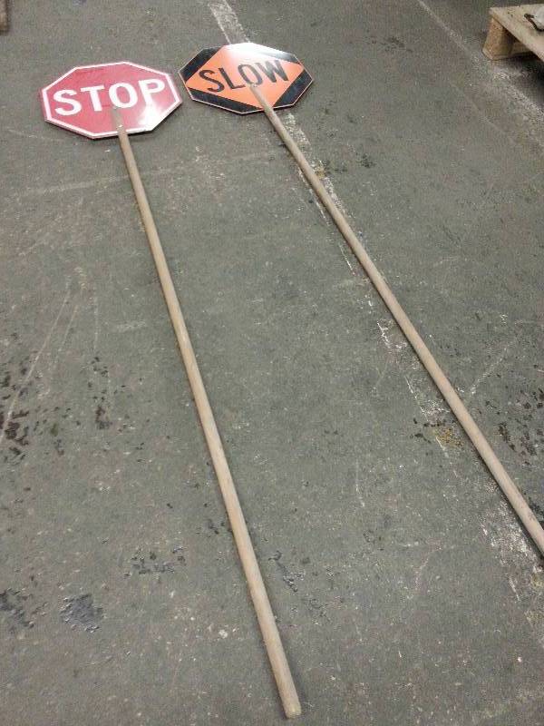 lot 3014 image: Construction zone, tree trimmers, asphalt companies all need this set of Slow Stop signs for the road guys.