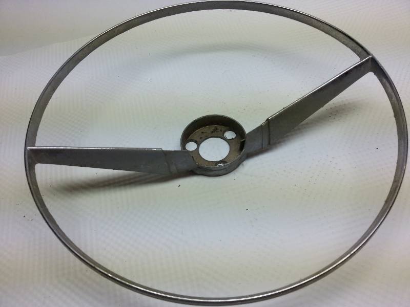 lot 1873 image: No cracks and the chrome might even clean up nice on this 1955 Chevy original steering wheel horn ring.