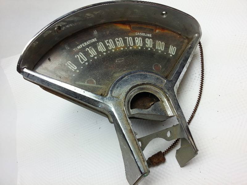 lot 1877 image: 1955 Chevy dash cluster.  We can see it came out of a stick car and nothing broke that I can see.