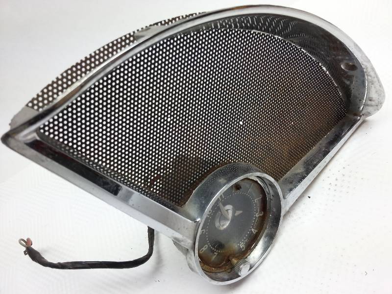 lot 1880 image: 1955 Chevy passenger side clock dash cluster.  Its been stored in the trunk that was open