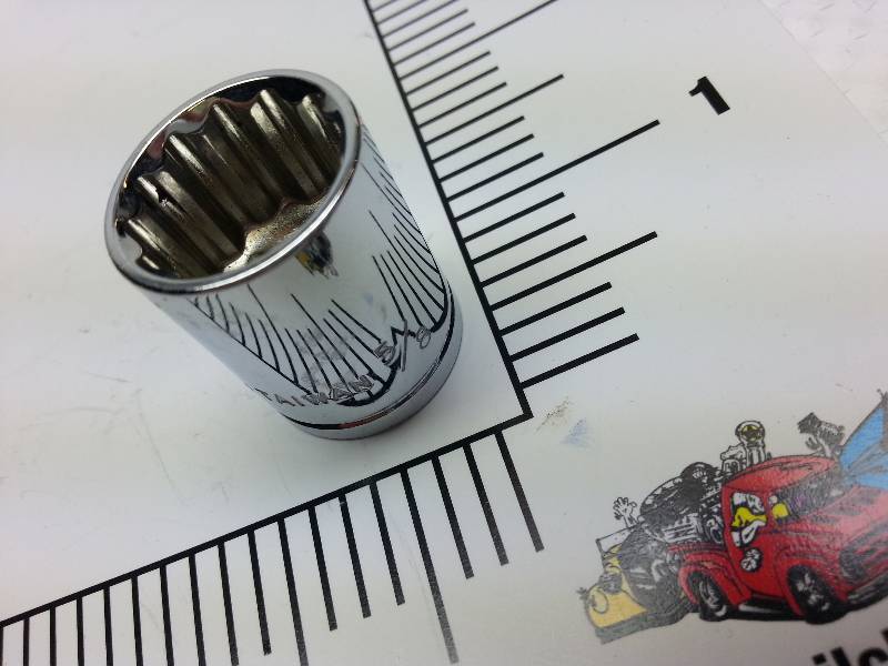 lot 1904 image: New Stanley Tools 38 drive Chrome size 58 12-point socket.  Maybe pick it up for less than a dollar $$$$