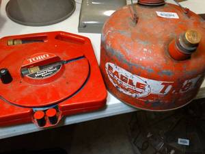 lot 37645 image: Toro Hose Reel System and Metal Eagle Gas Can