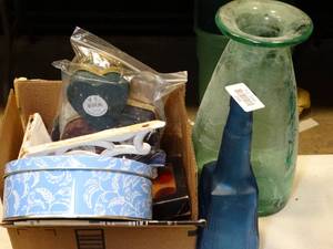 lot 37698 image: Wall mount plant holder, colorful glass bottles & more decor