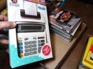 lot 37770 image: Calculator NIB and Small CD  DVD Collection