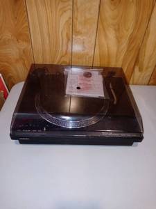 lot 3100 image: Toshiba record player with Bluetooth capability and paperwork