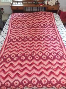 lot 1002 image: Pink Purple and White Crocheted Throw