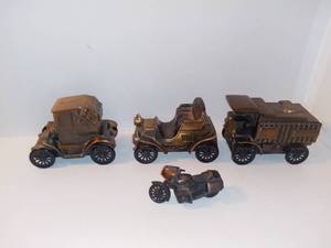 lot 4218 image: Lot of 4 Vintage Brass Automobile Banks