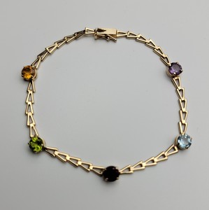 lot 104 image: 14k Yellow Gold Multi Gemstone Bracelet - 7 - 3.0g