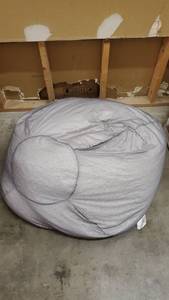 lot 7688 image: Mesh Bean Bag, Bag of Filler, Approximately 44 Wide