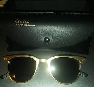 lot 2262 image: Carfia Gold Sunglasses With Case
