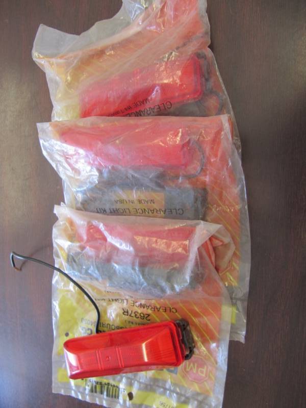lot 1753 image: 4 New in Bag Peterson 4 Rectangle RedMarker  lights # 2637R