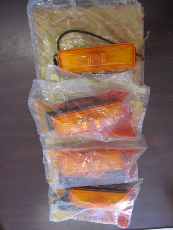lot 1757 image: 4 New in Bag Peterson 4 Rectangle Amber ClearanceMarker  lights # 2637A