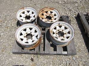 lot 7021 image: 4 COUNT WHITE TRAILER WHEELS MATCHING 6 LUG X 5.5 IN SIZE 14 DIAMETER  X 6 WHEEL WIDTH