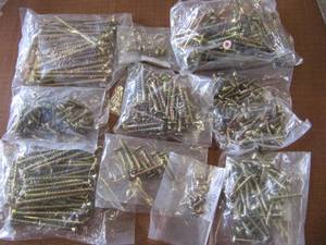 lot 1929 image: BAGS OF GOLD COLOR SCREWS