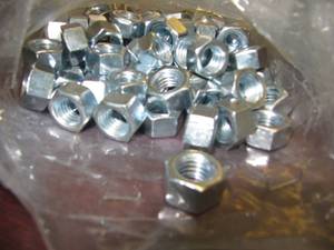 lot 1917 image: 110 PCS.  NEW 12-13 HEX NUTS