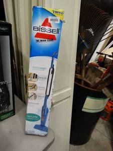 lot 23002 image: Bissell Featherweight Vacuum - New in Box
