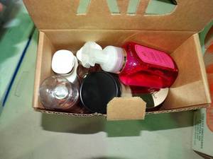 lot 23070 image: Lot of Scented Candles, Lotion and Body Spray