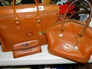 lot 23272 image: Dooney & Bourke all Weather Leather Clutch Purse and Handbag