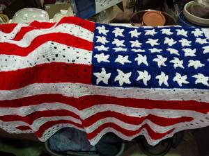 lot 23334 image: Americana lot  crochet lap blanket, fabric, quilt pieces and small table runner